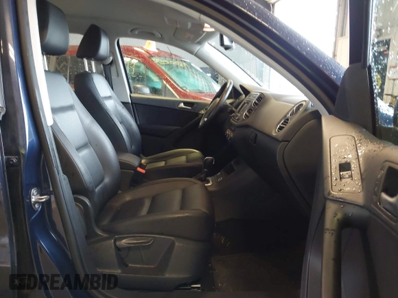 2016 Volkswagen Tiguan S with VIN WVGBV7AXXGW565289, listed as a IAAI auction lot 42113317 with 83,537 mi miles and . Bid and sale history available at DreamBid. Image 5.