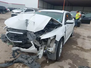 2015 Ford Taurus SEL with VIN 1FAHP2E88FG207444, listed as a IAAI auction lot 41728158 with Not Provided miles and . Bid and sale history available at carsss.com. Image 16.