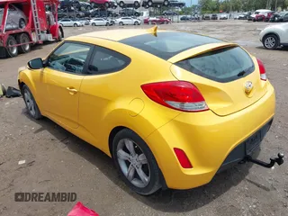 2012 Hyundai Veloster w/Black Int with VIN KMHTC6AD5CU046702, listed as a IAAI auction lot 42245379 with 136,327 mi miles and . Bid and sale history available at DreamBid. Image 3.