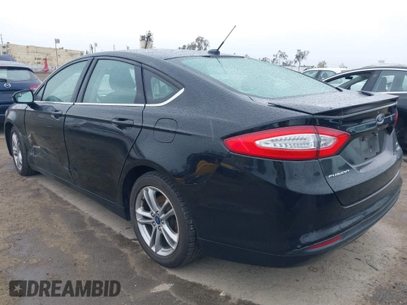 2016 Ford Fusion SE Hybrid with VIN 3FA6P0LU5GR356433, listed as a IAAI auction lot 41799204 with 157,670 mi miles. Bid and sale history available at carsss.com. Image 3.