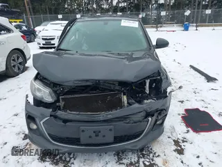 2018 Chevrolet Sonic LT z VIN 1G1JD6SB4J4106822, wystawiony jako IAAI lot #41591103 z przebiegiem 74 497 mil mil oraz . Historia ofert i sprzedaży dostępna na DreamBid. Obrazek 13.