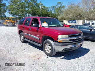 2003 Chevrolet Tahoe LS with VIN 1GNEC13VX3R243137, listed as a IAAI auction lot 41813828 with 313,433 mi miles. Bid and sale history available at carsss.com. Image 1.