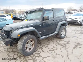 2012 Jeep Wrangler Rubicon with VIN 1C4BJWCG3CL274426, listed as a IAAI auction lot 41308170 with 127,014 mi miles. Bid and sale history available at carsss.com. Image 16.