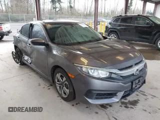 2017 Honda Civic LX z VIN 2HGFC2F51HH561610, wystawiony jako IAAI lot #41903143 z przebiegiem 102 784 mil mil oraz . Historia ofert i sprzedaży dostępna na DreamBid. Obrazek 1.