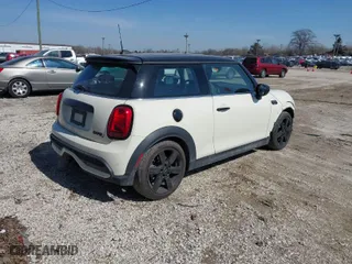 2023 MINI Hardtop 2 Door Cooper S with VIN WMW53DH09P2T13990, listed as a IAAI auction lot 41780668 with 17,105 mi miles. Bid and sale history available at carsss.com. Image 4.