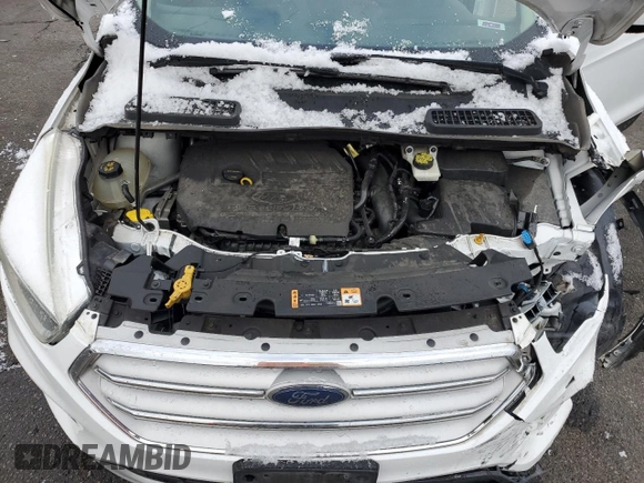 2018 Ford Escape SE z VIN 1FMCU9GD5JUB12877, wystawiony jako Copart lot #51973295 z przebiegiem 121 698 mil mil oraz Szkoda całkowita • Salvage title. Historia ofert i sprzedaży dostępna na DreamBid. Obrazek 11.