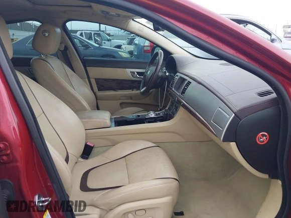 2012 Jaguar XF Portfolio with VIN SAJWA0HB5CLS21062, listed as a IAAI auction lot 41733179 with 125,614 mi miles. Bid and sale history available at carsss.com. Image 5.