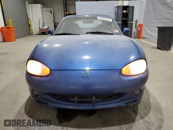 1999 Mazda MX-5 Miata with VIN JM1NB3532X0136645, listed as a Copart auction lot 59480265 with 160,936 mi miles and Clean title. Bid and sale history available at DreamBid. Image 5.
