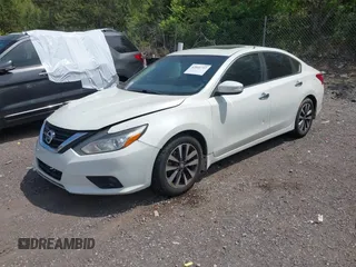 2016 Nissan Altima SR with VIN 1N4AL3AP9GC136005, listed as a IAAI auction lot 42041717 with 136,594 mi miles and . Bid and sale history available at DreamBid. Image 2.