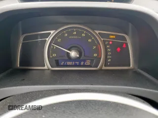 2010 Honda Civic LX with VIN 2HGFA1F52AH315977, listed as a Copart auction lot 54240115 with 217,883 mi miles and Salvage Title. Bid and sale history available at DreamBid. Image 9.