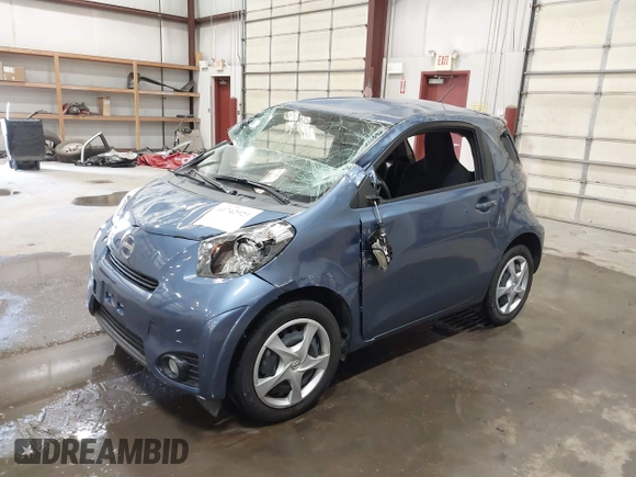2012 Scion iQ with VIN JTNJJXB01CJ010943, listed as a IAAI auction lot 41742923 with 1 mi miles. Bid and sale history available at carsss.com. Image 2.