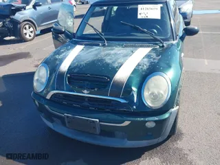 2006 MINI Cooper Hardtop S with VIN WMWRE33566TJ34081, listed as a IAAI auction lot 41265659 with 71,441 mi miles. Bid and sale history available at carsss.com. Image 6.