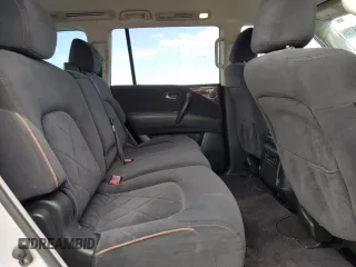2018 Nissan Armada SL z VIN JN8AY2ND6J9058698, wystawiony jako Copart lot #53836475 z przebiegiem 147 336 mil mil oraz Szkody całkowita. Historia ofert i sprzedaży dostępna na DreamBid. Obrazek 11.