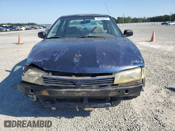 1999 Mitsubishi Mirage DE with VIN JA3AY26AXXU050527, listed as a Copart auction lot 74435914 with 101,224 mi miles and Salvage title. Bid and sale history available at DreamBid. Image 5.