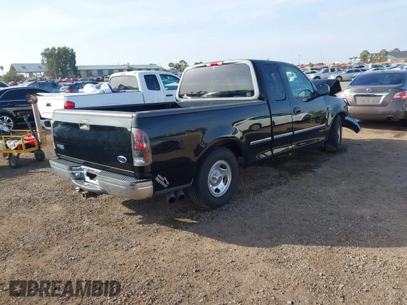 1998 Ford F-150 XL with VIN 1FTRX17L9WNA67717, listed as a IAAI auction lot 41604900 with 133,457 mi miles and . Bid and sale history available at DreamBid. Image 4.