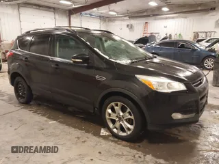 2013 Ford Escape SEL with VIN 1FMCU9H96DUC64584, listed as a IAAI auction lot 41357053 with 139,422 mi miles. Bid and sale history available at carsss.com. Image 1.