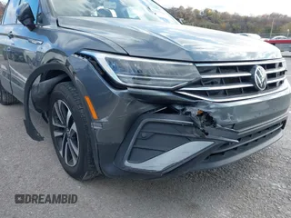 2023 Volkswagen Tiguan S with VIN 3VVRB7AXXPM033845, listed as a IAAI auction lot 40918862 with 38,122 mi miles and . Bid and sale history available at DreamBid. Image 20.