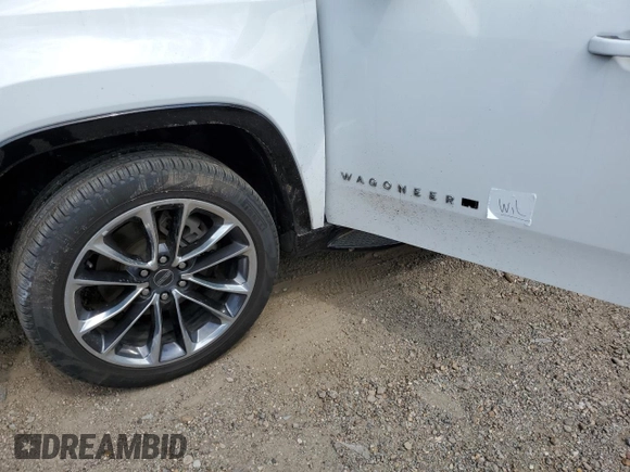 2023 Jeep Wagoneer Series II Carbide with VIN 1C4SJVBPXPS553377, listed as a Copart auction lot 55579265 with 16,510 mi miles and Salvage title. Bid and sale history available at DreamBid. Image 13.