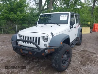 2014 Jeep Wrangler Unlimited Sport with VIN 1C4BJWDG9EL135077, listed as a IAAI auction lot 42324775 with 104,221 mi miles and . Bid and sale history available at DreamBid. Image 17.