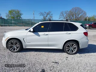 2015 BMW X5 xDrive50i with VIN 5UXKR6C5XF0J76697, listed as a IAAI auction lot 41953074 with 141,377 mi miles and . Bid and sale history available at DreamBid. Image 13.