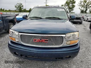 2006 GMC Yukon Denali z VIN 1GKEK63U16J122245, wystawiony jako Copart lot #59211415 z przebiegiem 125 340 mil mil oraz Czysty tytuł • Clean title. Historia ofert i sprzedaży dostępna na DreamBid. Obrazek 5.