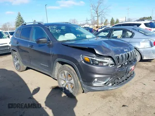 2020 Jeep Cherokee Limited with VIN 1C4PJMDX8LD617038, listed as a IAAI auction lot 41806440 with 64,963 mi miles. Bid and sale history available at carsss.com. Image 1.