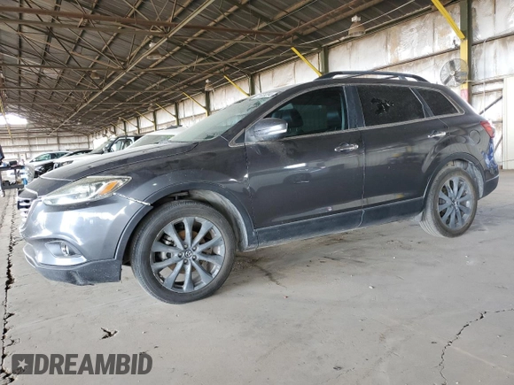 2015 Mazda CX-9 Grand Touring with VIN JM3TB2DV0F0463488, listed as a Copart auction lot 72659294 with 124,618 mi miles and Clean Title. Bid and sale history available at carsss.com. Image 1.