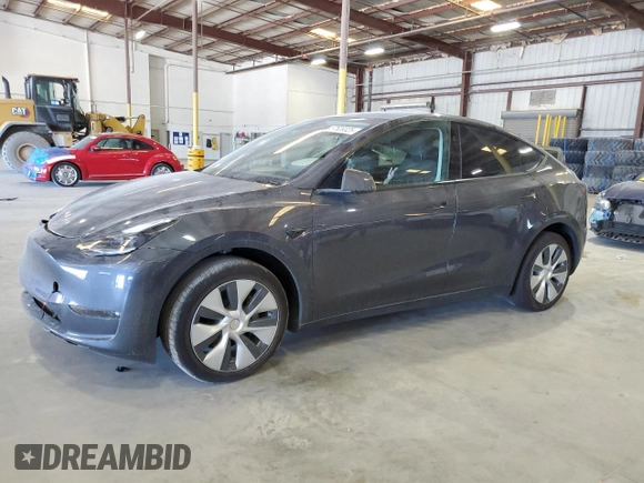2023 Tesla Model Y Long Range z VIN 7SAYGDEE3PF862038, wystawiony jako Copart lot #57639325 z przebiegiem 11 020 mil mil oraz Szkoda całkowita • Salvage title. Historia ofert i sprzedaży dostępna na DreamBid. Obrazek 1.