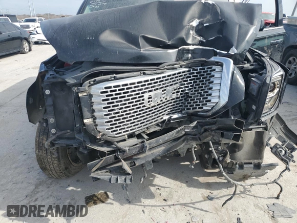 2015 GMC Yukon Denali with VIN 1GKS1CKJ2FR699959, listed as a Copart auction lot 42035195 with 0 mi miles and Salvage Title. Bid and sale history available at carsss.com. Image 13.