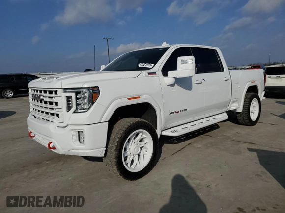 2021 GMC Sierra 2500HD AT4 z VIN 1GT49PEY6MF277074, wystawiony jako Copart lot #49231105 z przebiegiem 77 454 mil mil oraz Czysty tytuł • Clean title. Historia ofert i sprzedaży dostępna na DreamBid. Obrazek 1.