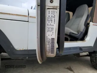 1993 Jeep Wrangler z VIN 1J4FY29S6PP245917, wystawiony jako Copart lot #58805235 z przebiegiem 162 170 mil mil oraz Czysty tytuł • Clean title. Historia ofert i sprzedaży dostępna na DreamBid. Obrazek 12.