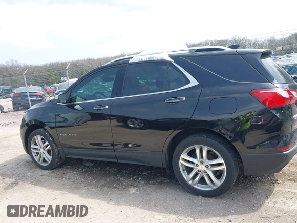 2019 Chevrolet Equinox Premier z VIN 2GNAXYEX5K6143922, wystawiony jako IAAI lot #42134219 z przebiegiem 105 496 mil mil oraz . Historia ofert i sprzedaży dostępna na DreamBid. Obrazek 14.