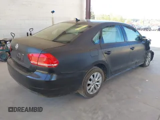 2015 Volkswagen Passat 1.8T Limited Edition with VIN 1VWAT7A36FC054484, listed as a IAAI auction lot 42078125 with 119,550 mi miles. Bid and sale history available at carsss.com. Image 4.