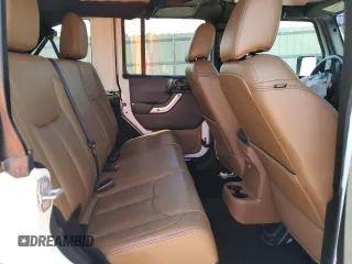 2018 Jeep Wrangler JK Unlimited Sahara with VIN 1C4HJWEG7JL910656, listed as a Copart auction lot 73414244 with 50,519 mi miles and Salvage Title. Bid and sale history available at carsss.com. Image 11.
