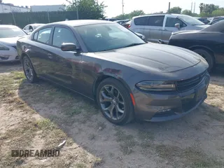 2015 Dodge Charger SXT with VIN 2C3CDXHG4FH886621, listed as a IAAI auction lot 41929127 with 123,542 mi miles and . Bid and sale history available at DreamBid. Image 1.