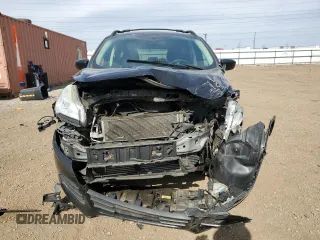2013 Ford Escape SE z VIN 1FMCU0GX1DUA20580, wystawiony jako Copart lot #52644595 z przebiegiem 151 143 mil mil oraz Szkoda całkowita • Salvage title. Historia ofert i sprzedaży dostępna na DreamBid. Obrazek 5.