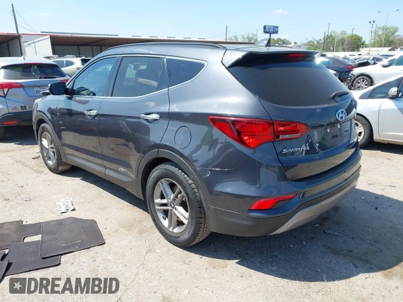 2017 Hyundai Santa Fe 2.4L z VIN 5XYZU3LB4HG462058, wystawiony jako IAAI lot #41861190 z przebiegiem 87 102 mil mil oraz . Historia ofert i sprzedaży dostępna na DreamBid. Obrazek 3.
