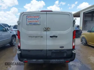 2015 Ford Transit Cargo with VIN 1FTNE1ZM0FKB08313, listed as a IAAI auction lot 42611938 with 335,409 mi miles and . Bid and sale history available at DreamBid. Image 16.