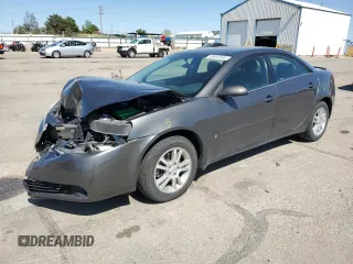 2006 Pontiac G6 6-Cyl z VIN 1G2ZG558X64115905, wystawiony jako Copart lot #55693365 z przebiegiem 99 334 mil mil oraz Szkoda całkowita • Salvage title. Historia ofert i sprzedaży dostępna na DreamBid. Obrazek 1.