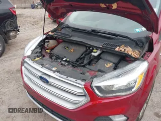 2018 Ford Escape SE z VIN 1FMCU9GD6JUA18684, wystawiony jako IAAI lot #41499540 z przebiegiem 105 127 mil mil oraz . Historia ofert i sprzedaży dostępna na DreamBid. Obrazek 10.