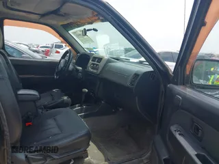 2001 Nissan Frontier SE with VIN 1N6ED27T81C305653, listed as a IAAI auction lot 42260643 with 245,547 mi miles and . Bid and sale history available at DreamBid. Image 5.