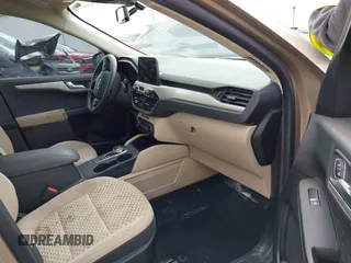 2020 Ford Escape SE Sport Hybrid with VIN 1FMCU0BZXLUC08683, listed as a IAAI auction lot 41882926 with 59,831 mi miles and . Bid and sale history available at DreamBid. Image 5.