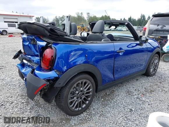 2025 MINI Convertible with VIN WMW23GX01S2X08664, listed as a IAAI auction lot 42506008 with 1,641 mi miles and . Bid and sale history available at DreamBid. Image 4.