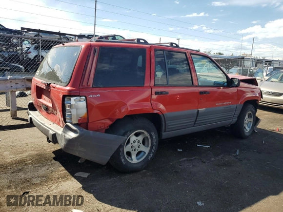 1996 Jeep Grand Cherokee Laredo with VIN 1J4GZ58S0TC170623, listed as a Copart auction lot 68019014 with 174,192 mi miles and Salvage Title. Bid and sale history available at carsss.com. Image 3.
