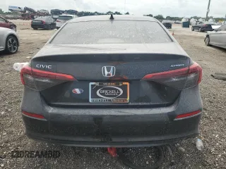 2024 Honda Civic Sport z VIN 2HGFE2F54RH594533, wystawiony jako Copart lot #64749274 z przebiegiem Nie podano mil oraz Nie do naprawy • Non repairable. Historia ofert i sprzedaży dostępna na DreamBid. Obrazek 6.