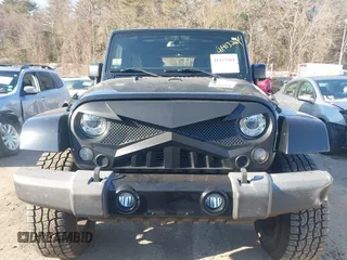 2018 Jeep Wrangler JK Unlimited Sahara with VIN 1C4HJWEG8JL921293, listed as a IAAI auction lot 41413264 with 90,566 mi miles. Bid and sale history available at carsss.com. Image 13.