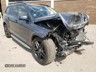 2015 Mercedes-Benz GL-Class GL 550 with VIN 4JGDF7DE7FA561521, listed as a Copart auction lot 56681512 with 67,329 mi miles. Bid and sale history available at carsss.com. Image 1.