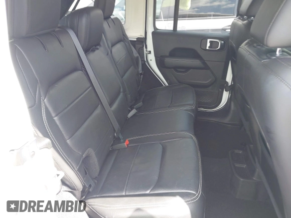 2018 Jeep Wrangler Unlimited Sahara with VIN 1C4HJXEG1JW205789, listed as a IAAI auction lot 42435877 with 57,587 mi miles and . Bid and sale history available at DreamBid. Image 8.