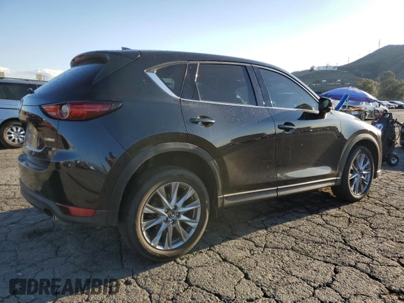 2020 Mazda CX-5 Grand Touring with VIN JM3KFADM0L0786565, listed as a Copart auction lot 48430915 with 60,390 mi miles and Salvage Title. Bid and sale history available at carsss.com. Image 3.
