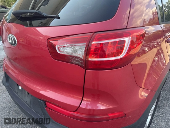 2013 Kia Sportage LX with VIN KNDPB3A26D7461145, listed as a IAAI auction lot 42769820 with 166,032 mi miles and . Bid and sale history available at DreamBid. Image 6.